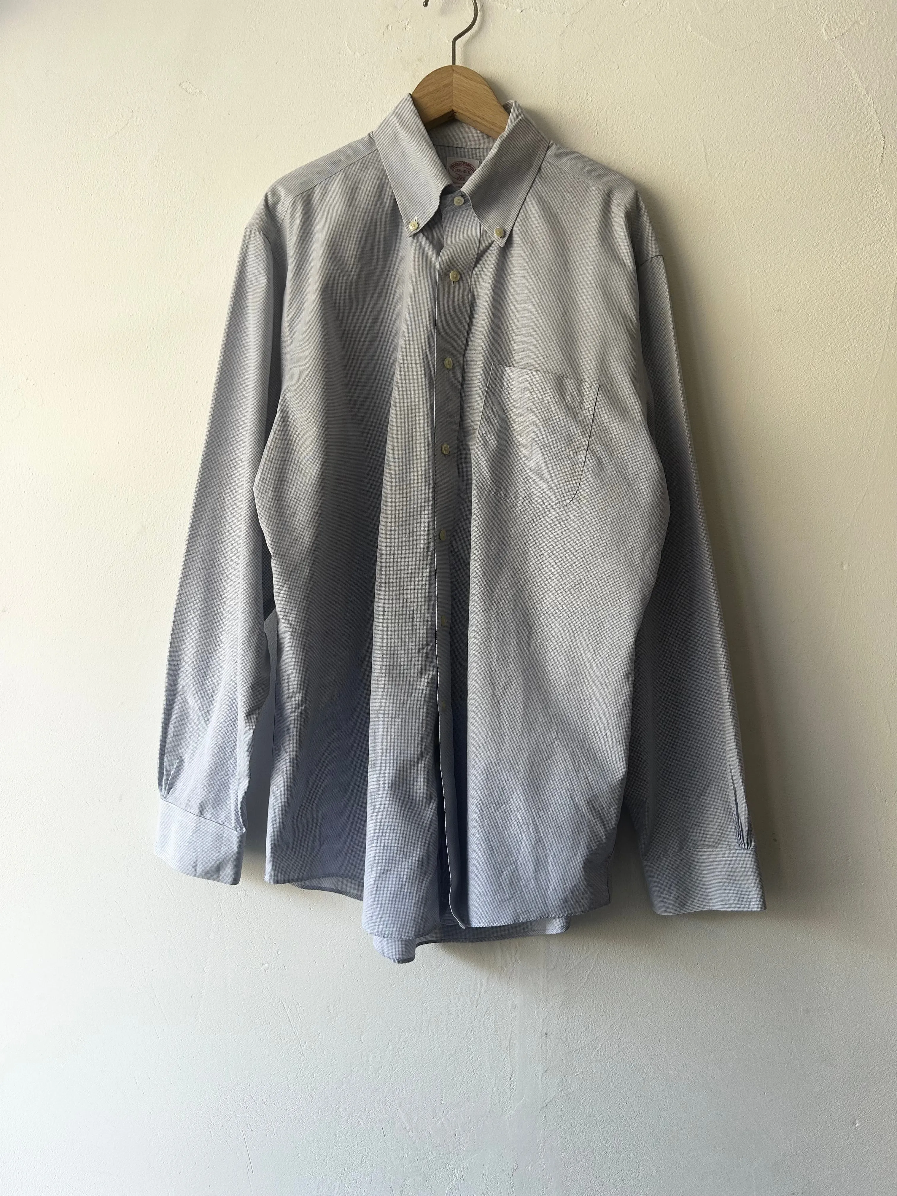 Brooks Brothers checked shirts.